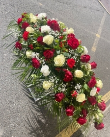 red and white rose coffin spray